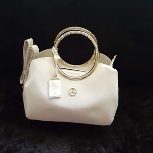 Authentic Mercedes pearl white burgundy or wine with straps